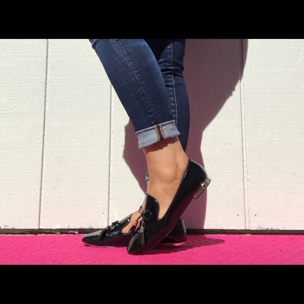 Zara shoes against the floor with a small heel of